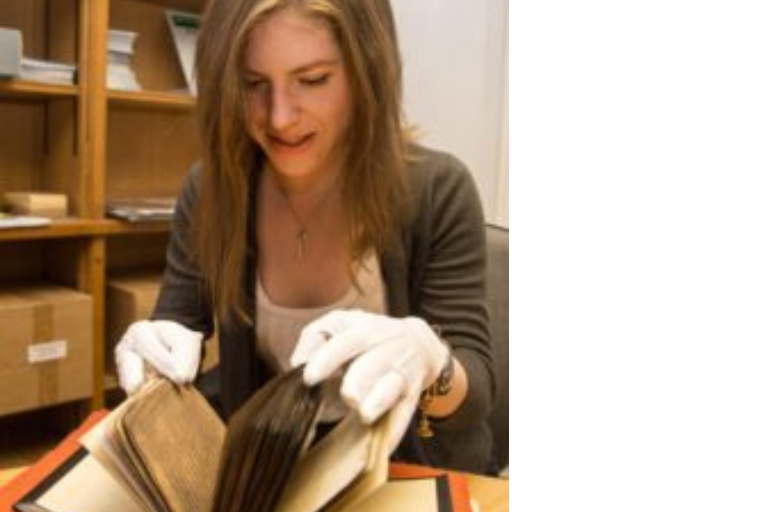 person looking at book